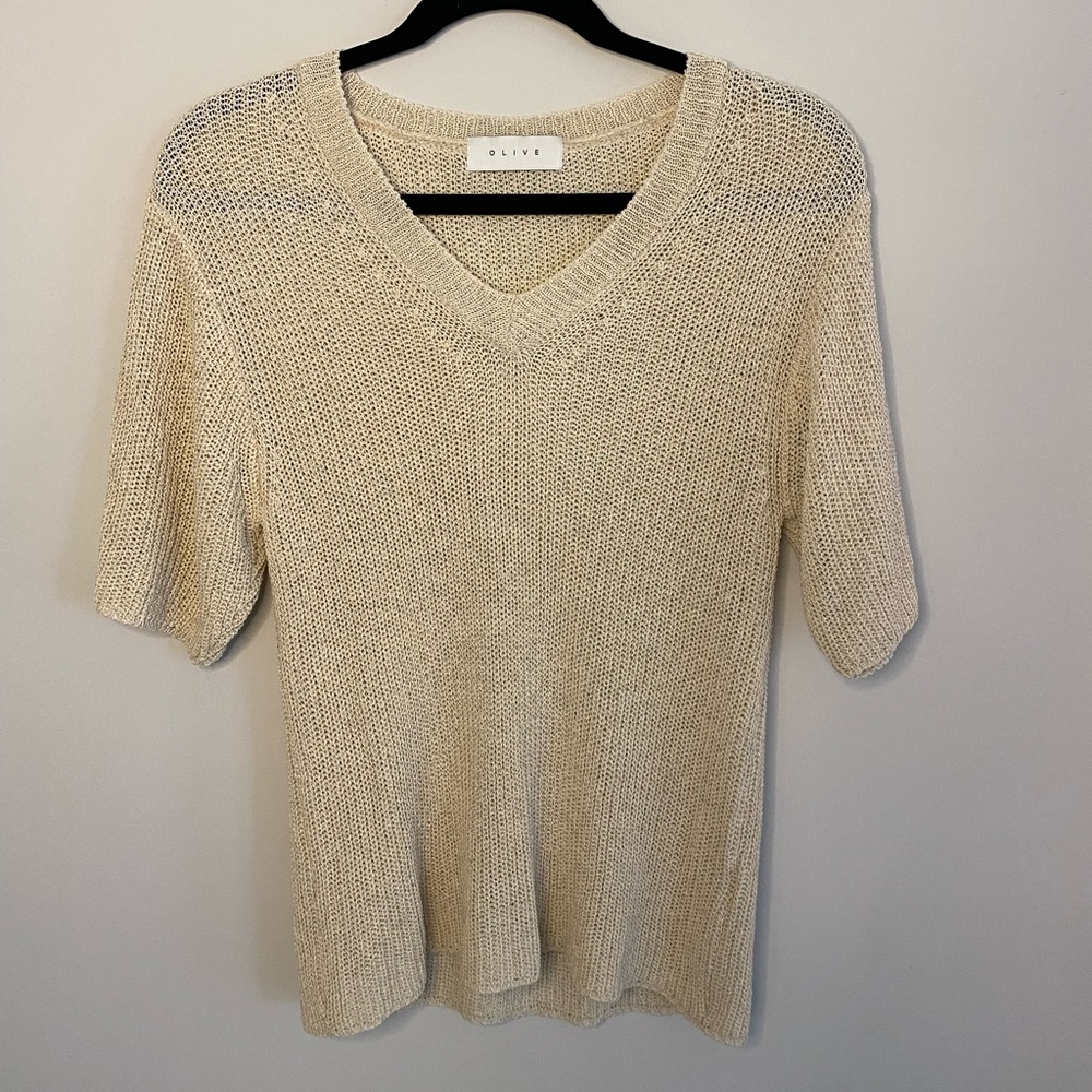 Beige knit top by OLIVE